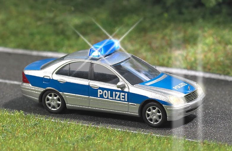 Busch 5615 Mercedes Classe C Polizia con lampeggianti funzionanti e fari illuminati