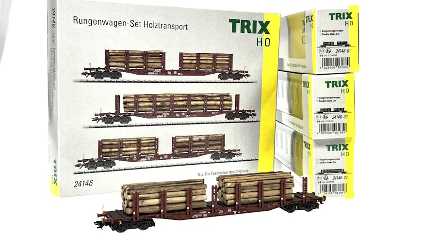 Trix 24146 DB set tre carri pianale con carico di tronchi ep.VI
